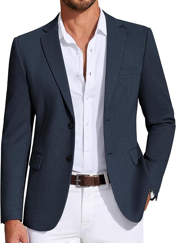 Dark tailored blazer, Bernard Holland's signature piece