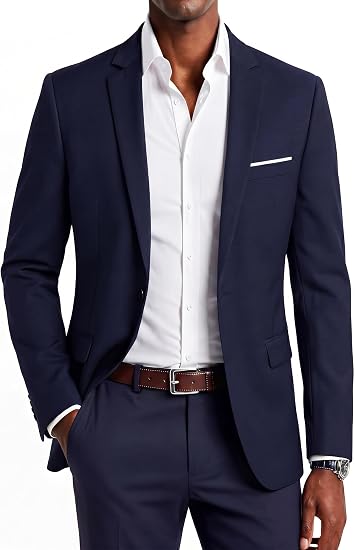 Kendall Roy inspired outfit with navy blazer crew neck sweater charcoal trousers and black sneakers